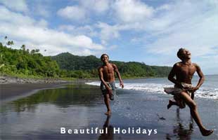 boys playing on beach in samoa