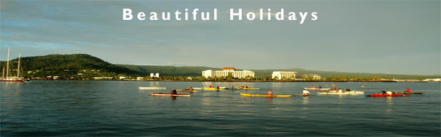 canoes in apia harbour, the capital of samoa islands